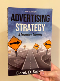 Advertising Strategy by Dereck D. Rucker (6th Edition)