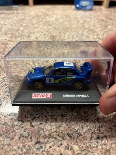 GREAT FOR CHRISTMAS! I'm offering a selection of REAL-X diecast cars, each meticulously detailed and...