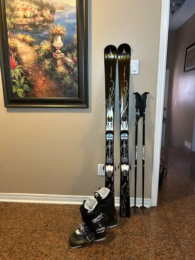 150 Atomic ski with boots ,poles , View more