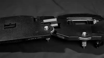 These are two semi-automatic negative holders, one for 35mm film (SOLD) and one for 6x7 or 6x6 film....
