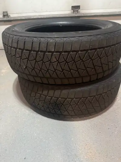Winter tires ,245/60/20 , good condition BRIDGESTONE $ 350 , each . Value 500 + Taxes at Cosco