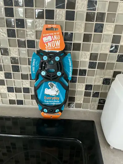 For sale. NEW Traction aid suitable for most footwear Size : small-medium (women 5-9/men 3-7)