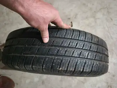 Good 1 Michelin Tire PLUS RIM Size 185 70 R14 M+S *REAL DEAL* (Located in Chestermere 5 minutes from...