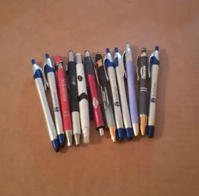 An assortment of promotional ballpoint pens with stylus tips for just $2 each. Available for pick up...