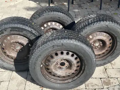 Snow tires on rims. Toyo GSI 6. 235/65R17. Fit 2012 Sienna or similar. Steel rims are original and h...
