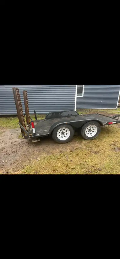 Lowboy trailer great four mini excavator or small tractor or whatever has brand new tires, brand new...