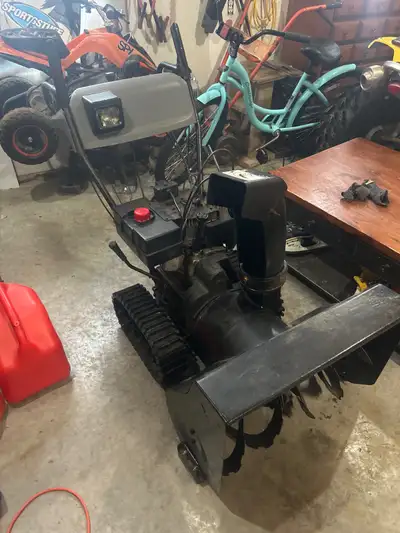 MTD tracked snowblower works great. Has power stearing, electric start.