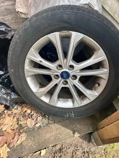 MICHELIN 235/55/R17 All season tires on ford rims set of 4 From Ford Escape, lots of tread left, do...