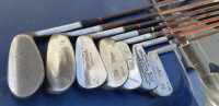 Seven vintage golf clubs for sale with bag