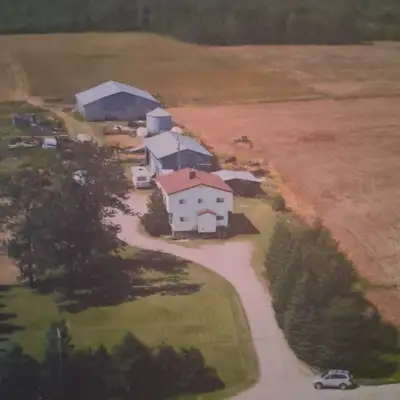 Step back in time with this 2storey farmhouse 8 minutes from town on paved road . Featuring 6 bedroo...