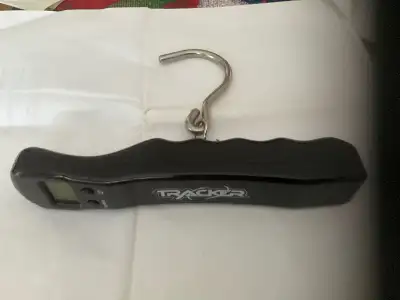 Tracker digital luggage weigh scale helps weigh bags or parcels with accuracy. Measures in kg or lbs...
