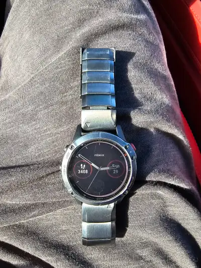 Selling my fenix watch. Watch is 9.5/10 Stainless strap is 9/10 Comes with brand new unopened orange...