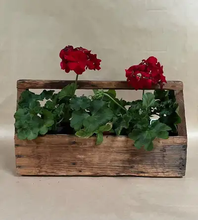 This solid vintage wooden planter holds three 4 1/2" pots or can be filled with earth. It measure 17...