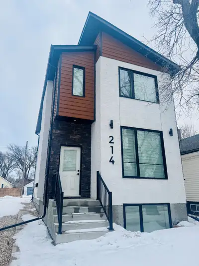 Home is an open concept with luxury vinyl flooring through out. Massive kitchen and island with extr...
