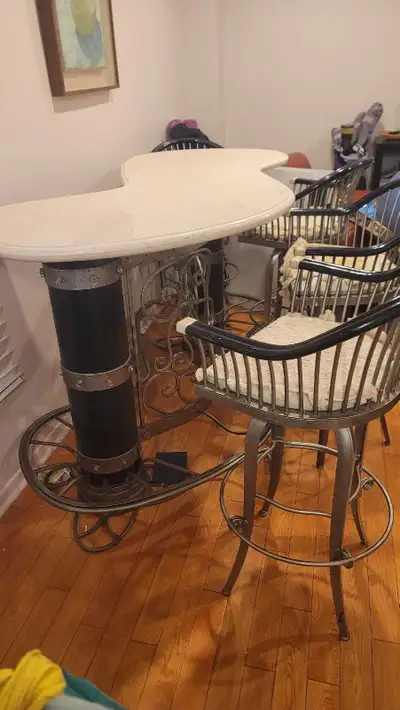 Bar high table with 4 chairs top has stone., View more