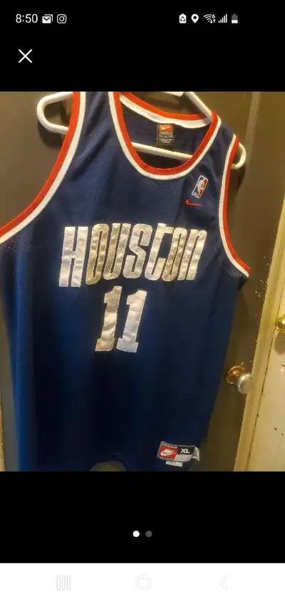 Vintage Nike NBA Houston Rockets jersey. Features Yao Ming's name and number 11. Size XL. Excellent...