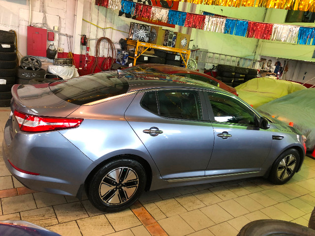 2012 KiA OPTiMA HYBRID PREMIUM/ CUIR/ CAMÉRA/JAMAIS ACCIDENTÉ dans Autos et camions  à Ville de Montréal - Image 4