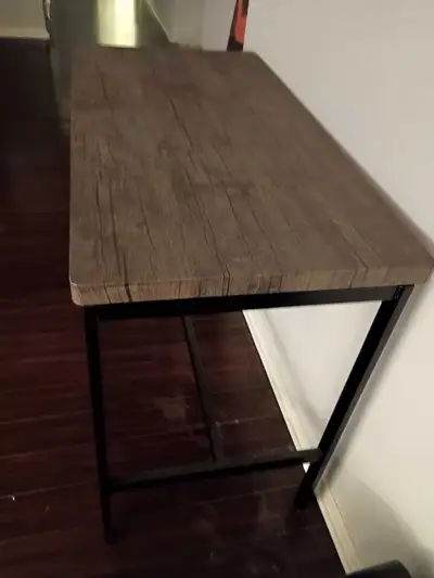 Free table from Ikea. Measures 45 inches long and 26 inches wide. Higher type of table meant to be p...