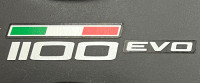 Ducati Monster 696,796,1100 key Guard fuel tank top cover OEM