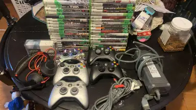The Xbox and Xbox 360 video game bundle includes a collection of games for both consoles, offering h...