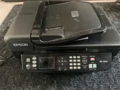 EPSON Wireless WiFi Printer Papers included. 5 extra cartridges spare and printers has ones ready to...