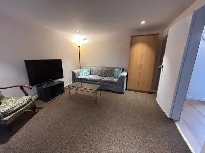Room for rent in the basement with own bathroom and kitchen and laundry