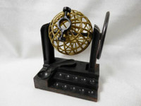 Vintage "Bingo Lottery Cage" miniature diecast pencil sharpener.