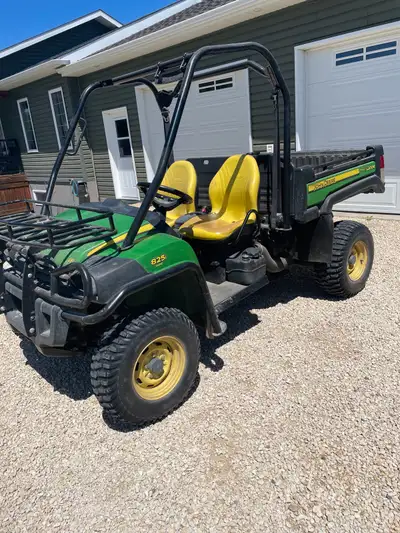 2010 John Deere gator 825 efi, electric dump box, well maintained in good condition, runs good , sma...