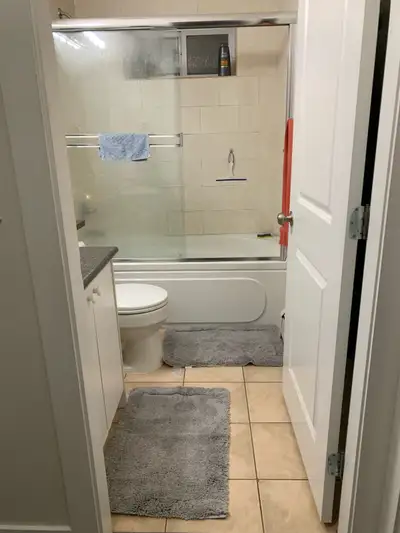 Hello! There's a room in a 3-bedroom basement suite available for rent. It's located in South Newton...