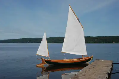 She's brand new, built by me to Iain Oughtred's plans, has passed her 'sea trials' with flying colou...