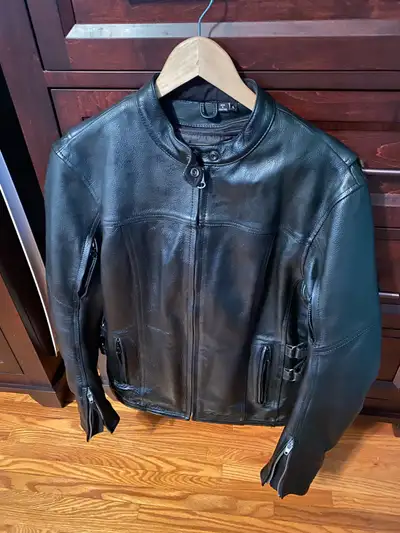 This is a steal and is like new! Only worn a few times. Ladies Joe Rocket motorcycle jacket. All gen...