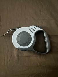 Brand New Double Switch Retractable Leash.