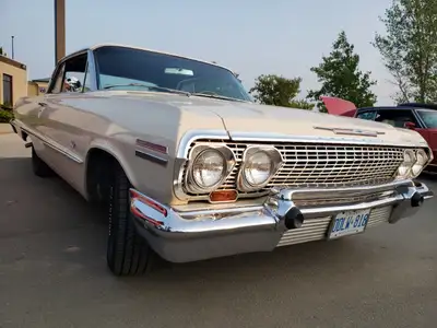 1963 impala ,327 250 hp w/lpowerglide transmission southern car older paint , solid floors , trunk,...