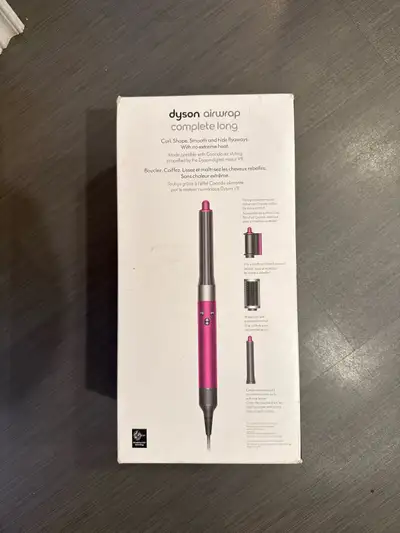 Brand new Dyson air wrap sealed May be opened in person as well