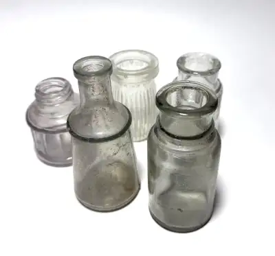 Set of 5 small vintage glass apothecary / medicine-style bottles with great authentic age and charac...
