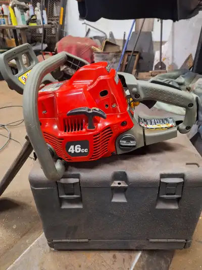 Homelite chainsaw + case, View more