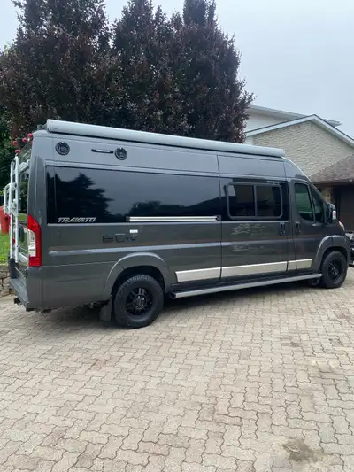 A1 condition...like new. Fuel efficient. Comes with many upgrades including Solar lithium batteries...