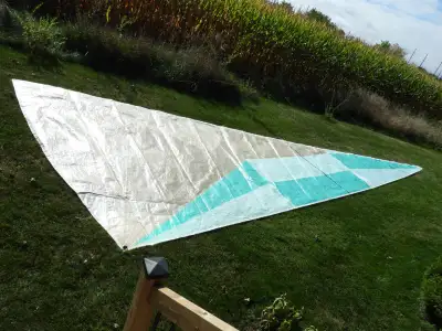 Scrim Mylar head sail with the following measurements--Luff=37'2", Leech=34'7", Foot=12'. This is a...