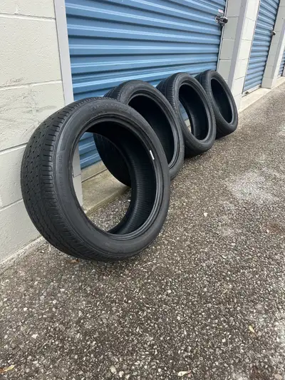 Set of four 215/50r17 91H Firestone FT140 all season tires. In excellent condition with good remaini...