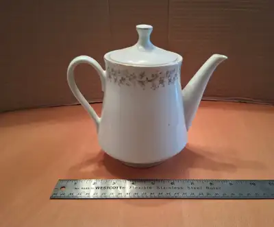 white china coffee pot with floral trim, View more