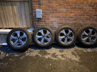 Nearly new Goodyear winter command tires on 18”OEM rims with TPMS sensors for a 2021 Ford Mach e. 22...