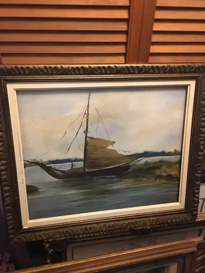 Original oil painting of a early sailboat stuck on the shore damaged and ravaged by wind and weather...