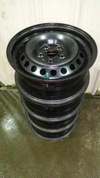 Four 15X6J-5X108mm (4.25 in) Ford steel rims with TPMS sensors.
