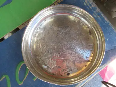 This child's dish/bowl has an engraved picture from the "Uncle Wiggly" series by American author How...
