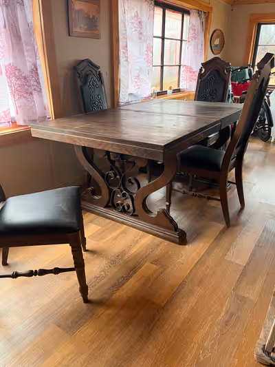 Unique Antique table and chairs that need to be refinished. Wrought iron and wood on base. It has be...