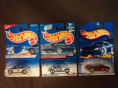 This lot includes a white with a soccer ball decal (#406), white (#40), and a dark red (#240) Shelby...