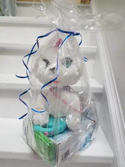 YOU GET: -a robotic dog toy with batteries included -a frog storage toy bag -an inflatable shower ca...