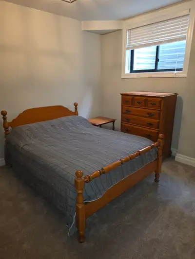 Complete solid wood bedroom suite. Bed, dresser mirror,  night s, View more