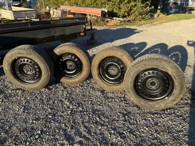 Set of 4 snow tires and rims Size - 225/65. R17 Studless Michelin X-Ice Used on Nissan Rogue Treads...