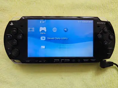 I have a sony psp 2001 in black. Good condition and modded. Comes with charger, new battery and 32G...